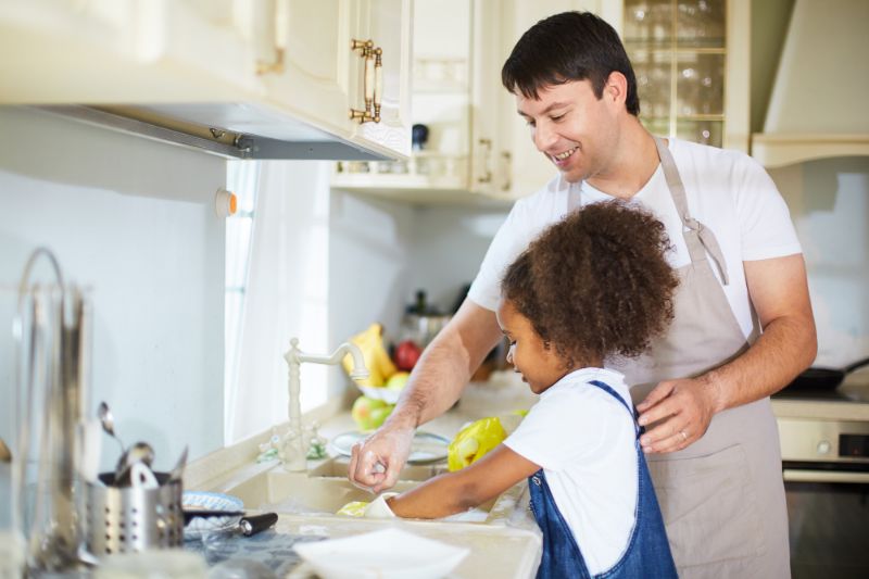 father and daughter in the kitchen