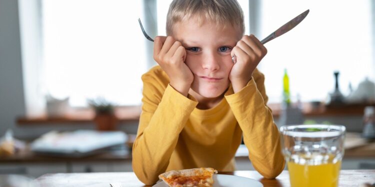 Kid cooking and feeling bored